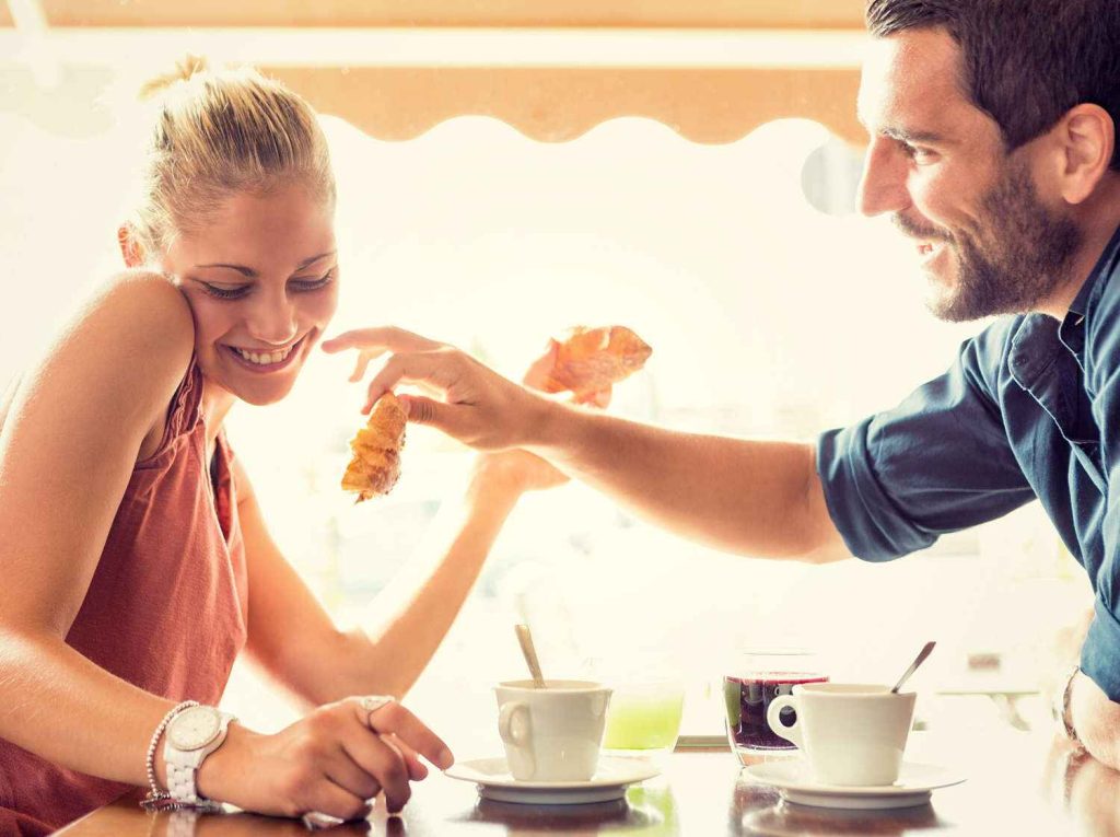 A man teasing his partner while flirting