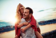 20 Awesome FAQs: How to Revive Romance & End “Roommate Syndrome Happy young couple having fun outdoors.