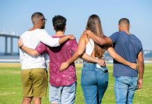 How to Explore Ethical Non-Monogamy and Choose Your Best Fit Three men one woman in an ethical non-monogamous relationship