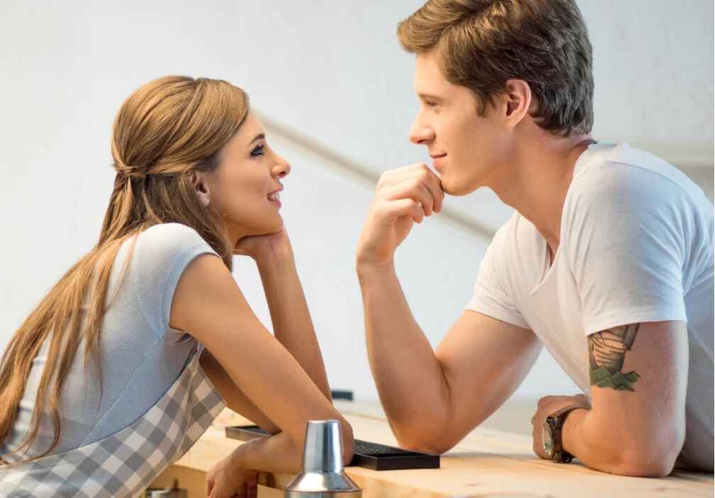 a woman shows interest in a man by fitting  him in her schedule