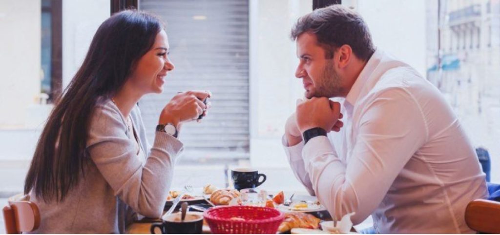 man showing interest without coming on too strong by beibg curious and attentive